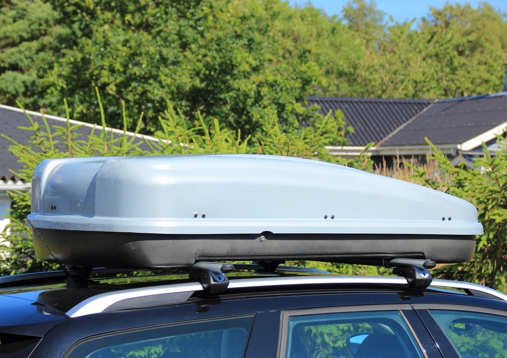 Roof box fitted on a car