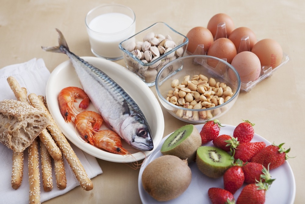 photo showing different types of food (eggs, fish, fruit...)