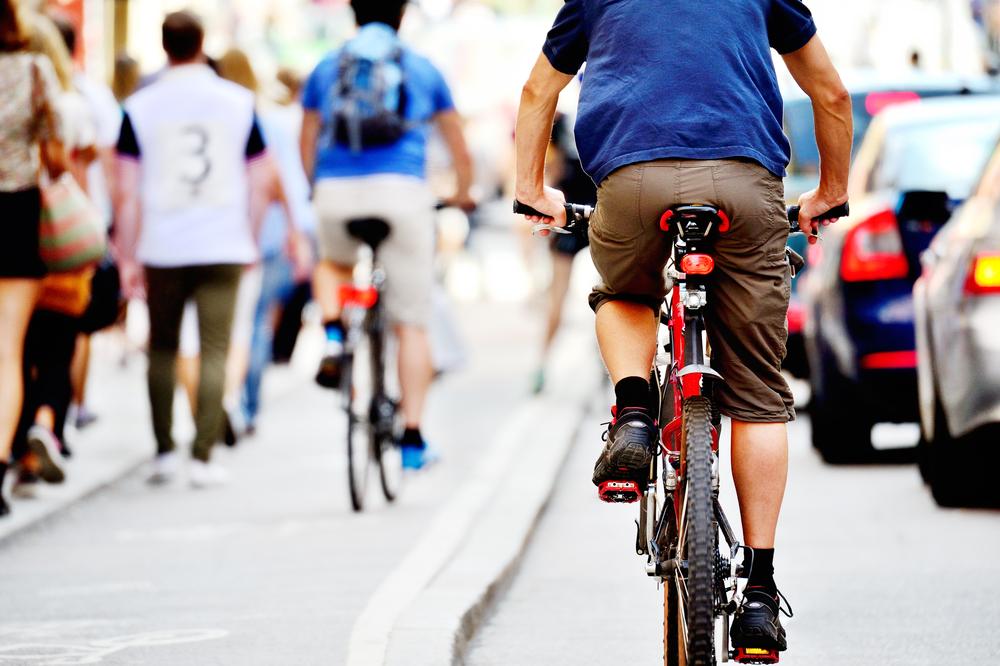 cyclists on the road in a city